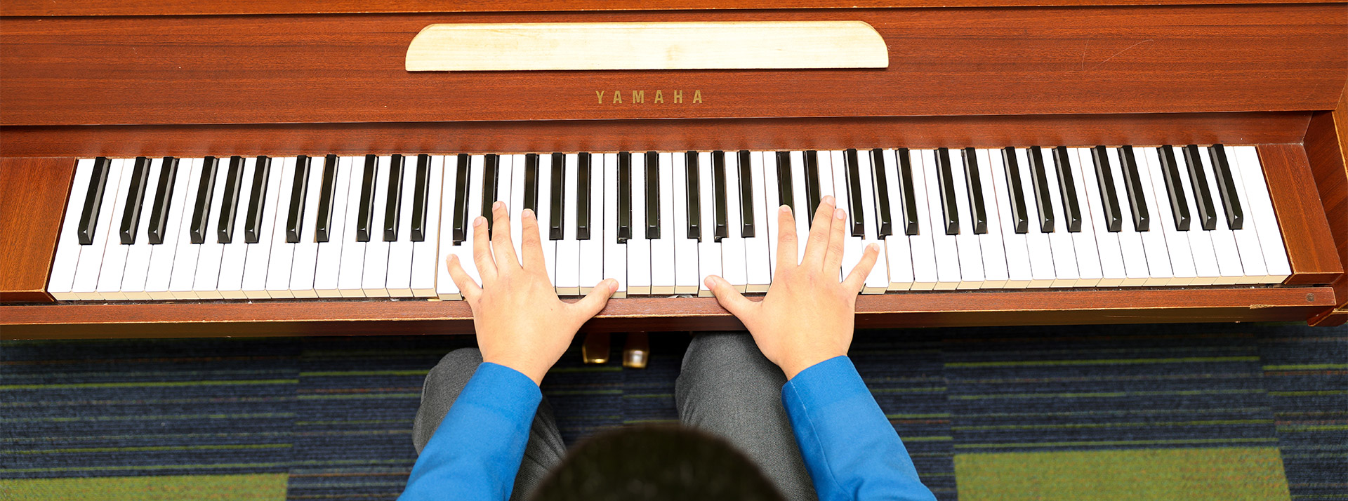 Patrician Brothers Catholic College Blacktown student on piano