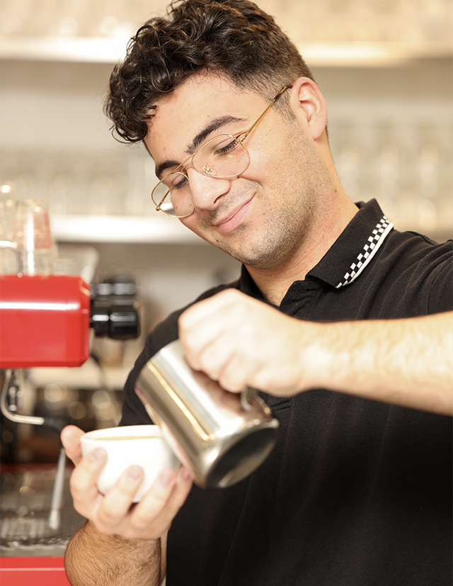 Patrician Brothers Catholic College Blacktown student making a coffee